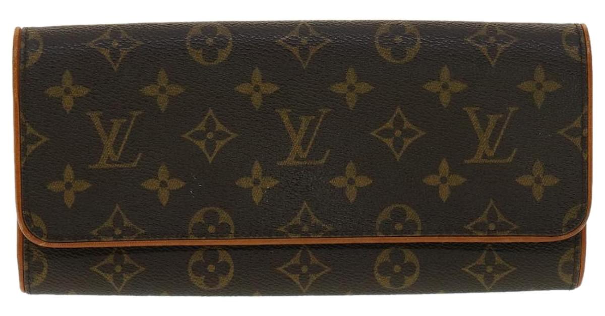 cloth handbag Louis Vuitton Brown in Cloth - 11629885