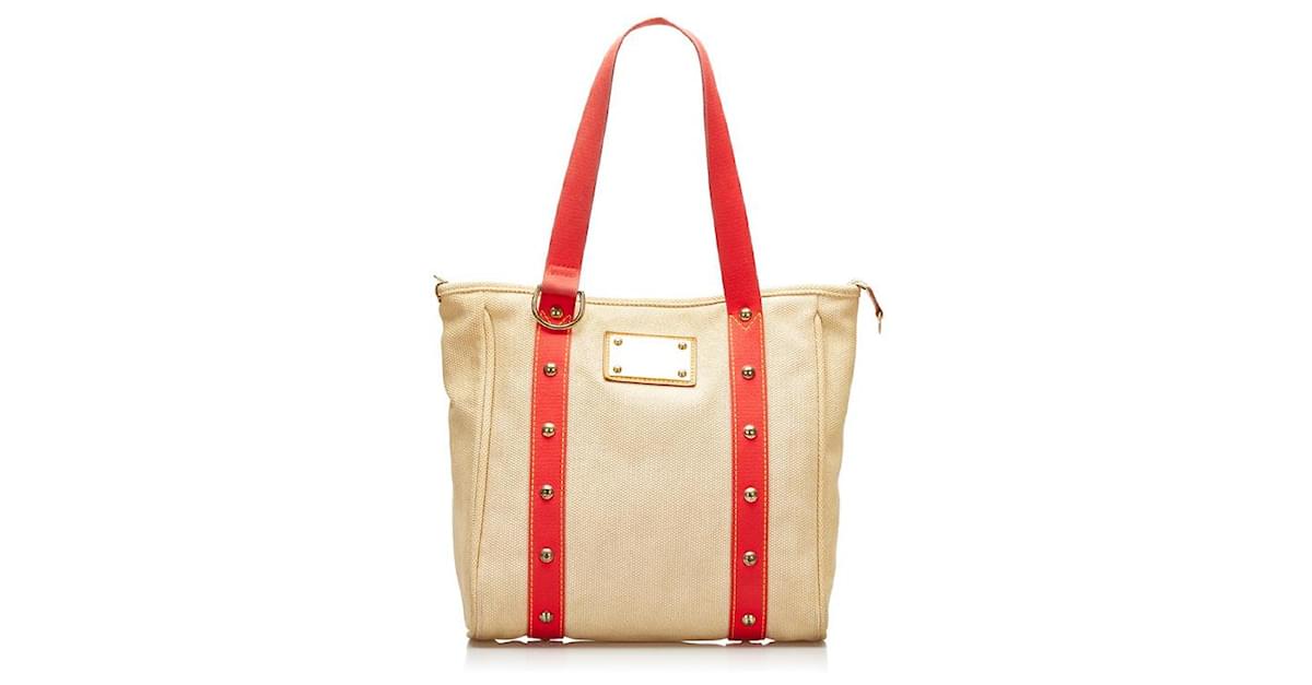 Louis Vuitton Limited Edition Beige Canvas Antigua Cabas MM Bag - Yoogi's  Closet