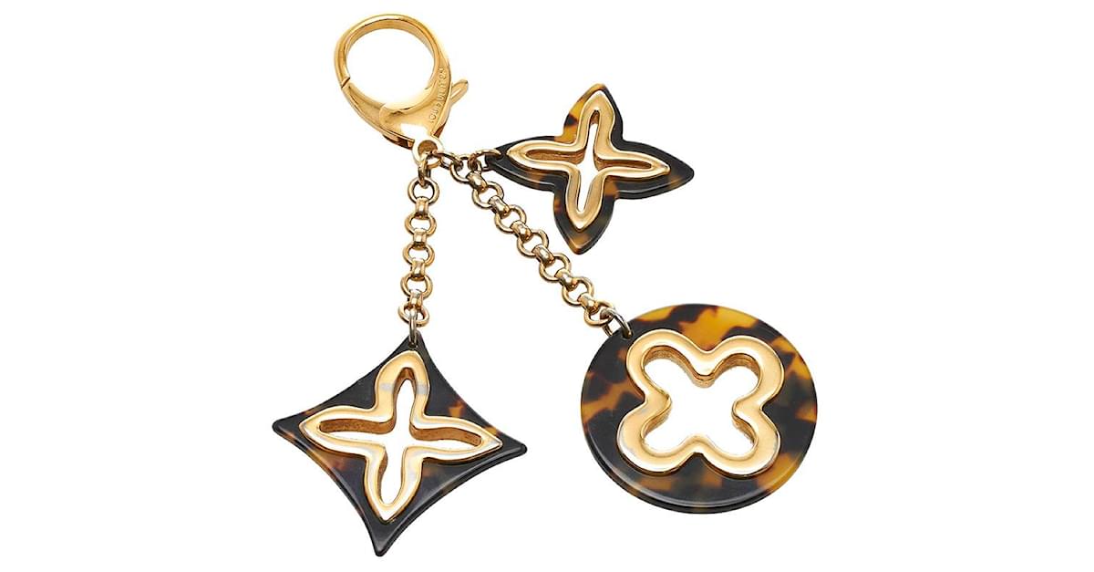 Louis Vuitton Insolence Bag Charm Ｍ65844 Golden Metal ref.745498 - Joli  Closet