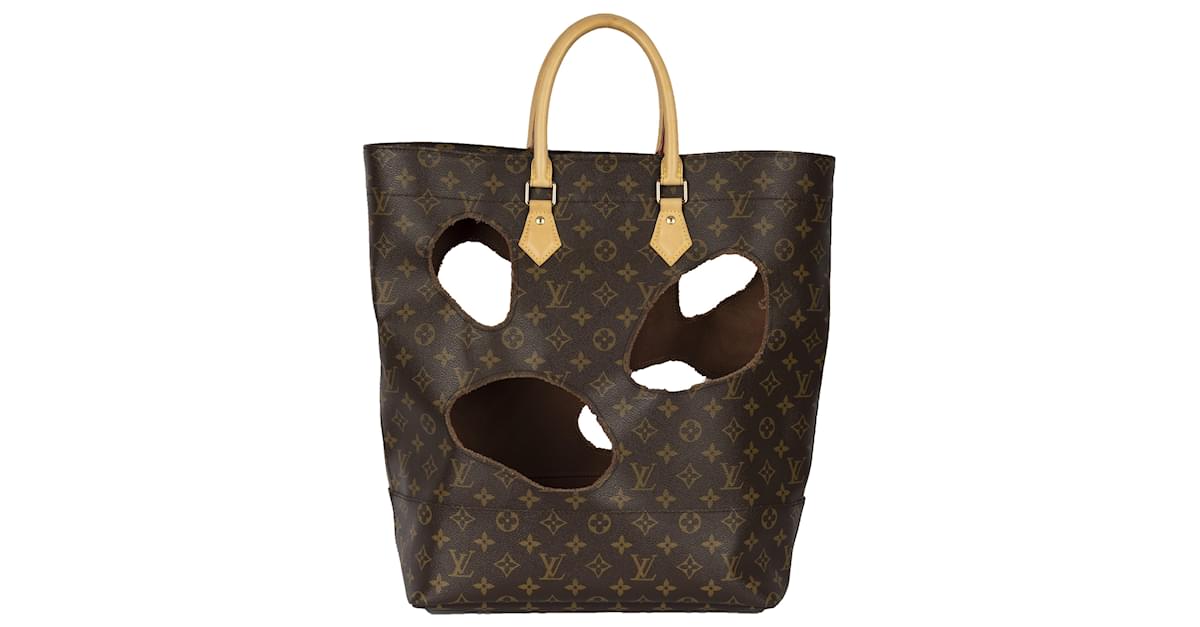 This Louis Vuitton Monogram Tote Comes With Holes Burned Into It & Costs  $11,757 In Case You Have Cash To Burn 