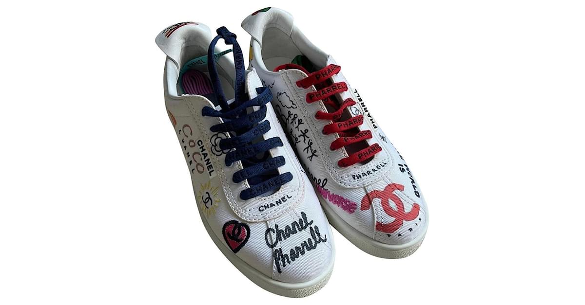 Chanel x Pharrell by Lagerfeld Graphic Trainers White Multiple colors  Leather Cloth Rubber ref.776795 - Joli Closet