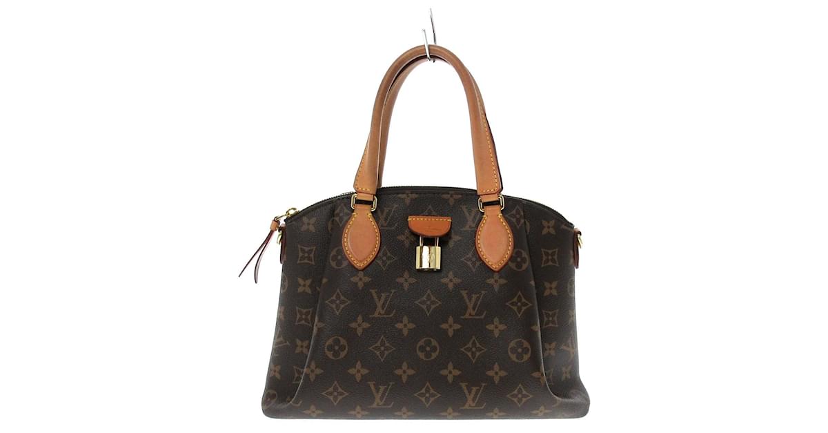 Louis Vuitton LV Rivoli PM monogram Brown Cloth ref.966124 - Joli Closet