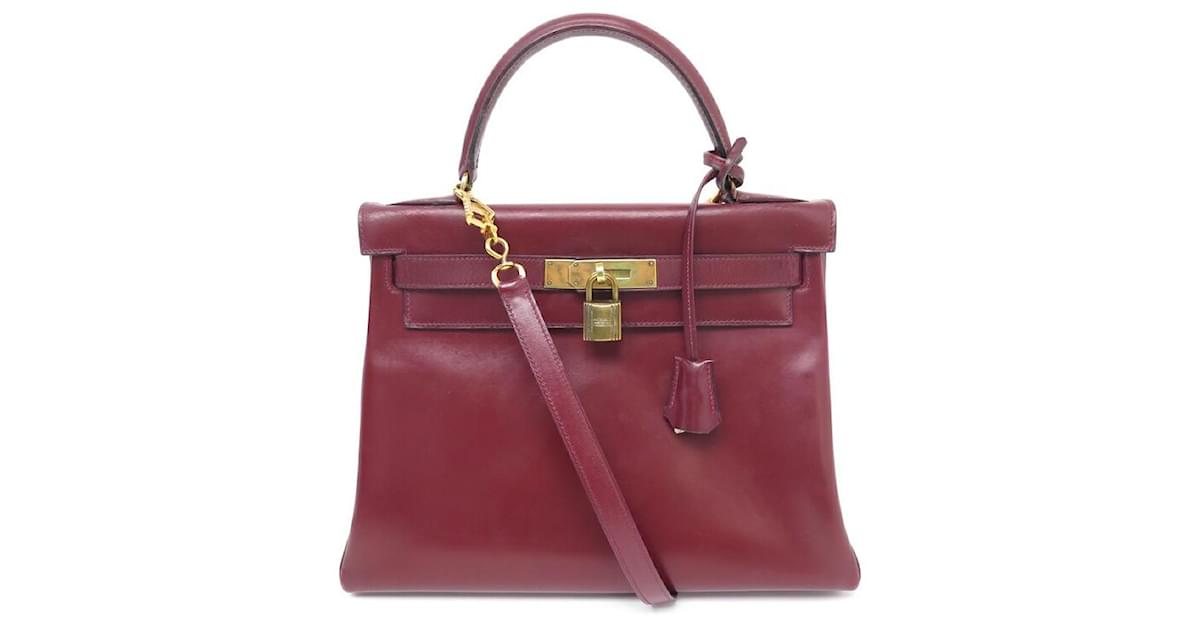 Hermès VINTAGE HERMES KELLY HANDBAG 28 RETURNS IN BURGUNDY BOX