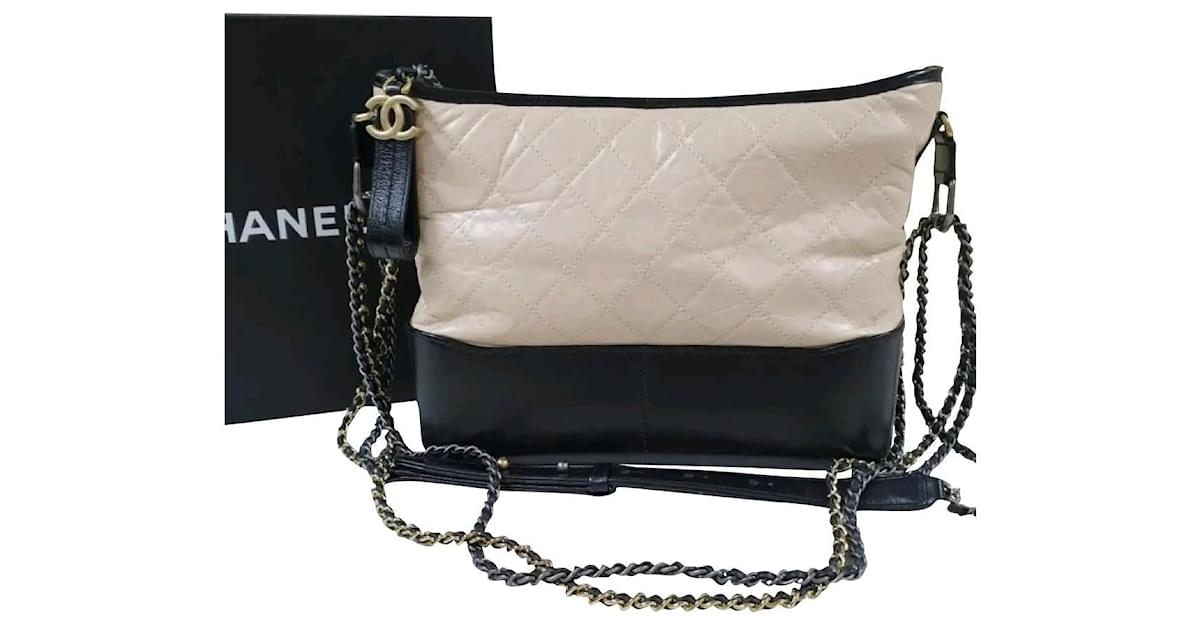Chanel Gabrielle Quilted Aged calf leather Beige Black Hobo Bag Multiple  colors ref.803944 - Joli Closet
