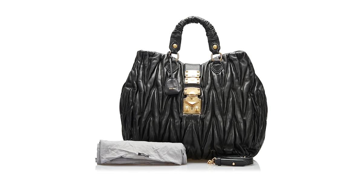 Miu Miu Matelasse Coffer Tote Bag RN0476 Black Leather Pony-style calfskin  ref.848956 - Joli Closet