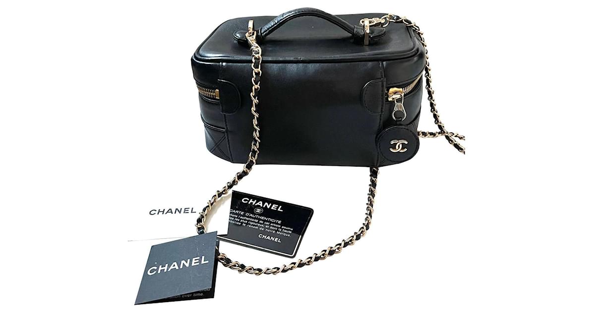 Vanity Chanel Trousse de toilette ronde Caviar Cuir Noir ref