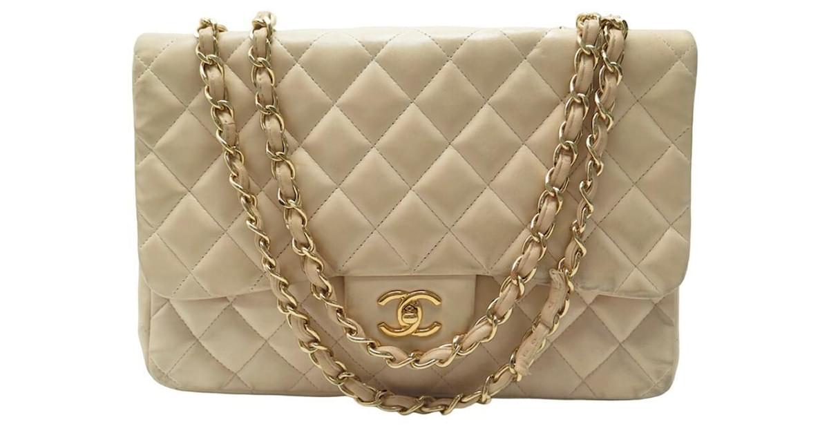 CHANEL CLASSIC TIMELESS JUMBO HANDBAG IN BEIGE PURSE QUILTED LEATHER  ref.875261 - Joli Closet