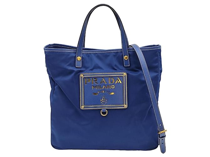 Prada tote shoulder bag in light blue nylon with gold logo Prada tote shoulder bag in light blue nylon with gold logo