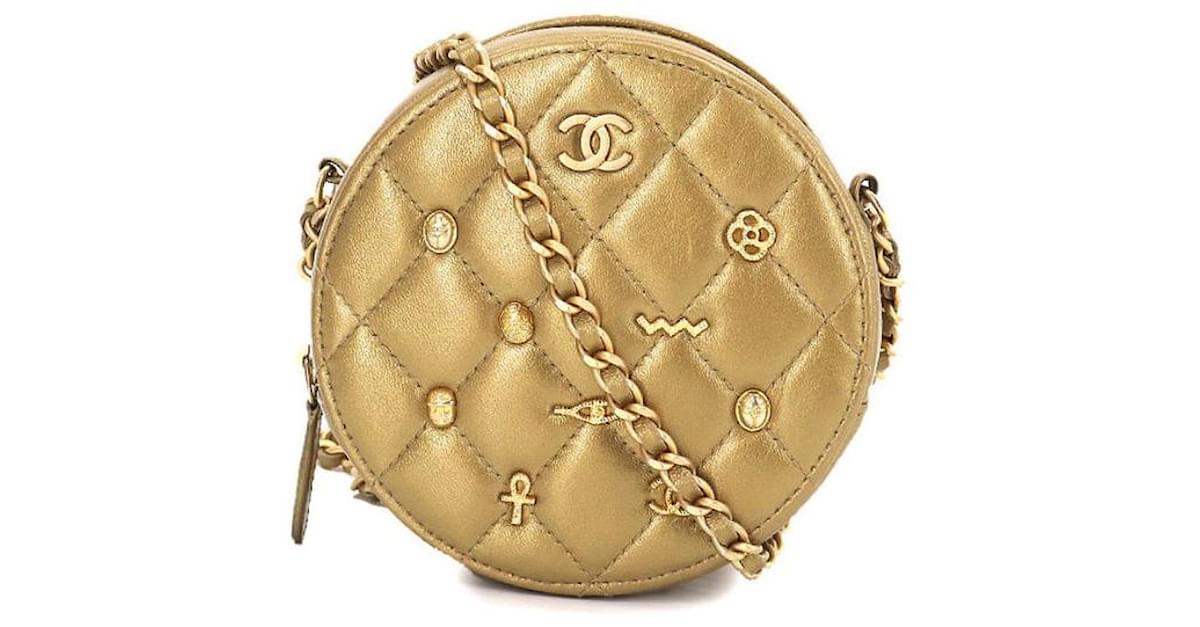 Chanel 19a, 2019 Fall Gold Leather Amulet Symbols Paris Egypt New York  Métiers De Arts Limited Edition Round Crossbody Bag. Like new In excellent