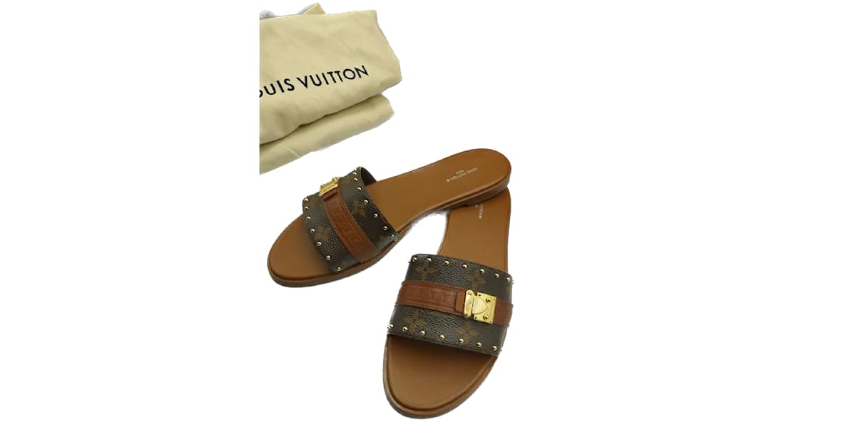 Louis Vuitton Lock It Mule Gold. Size 38.5