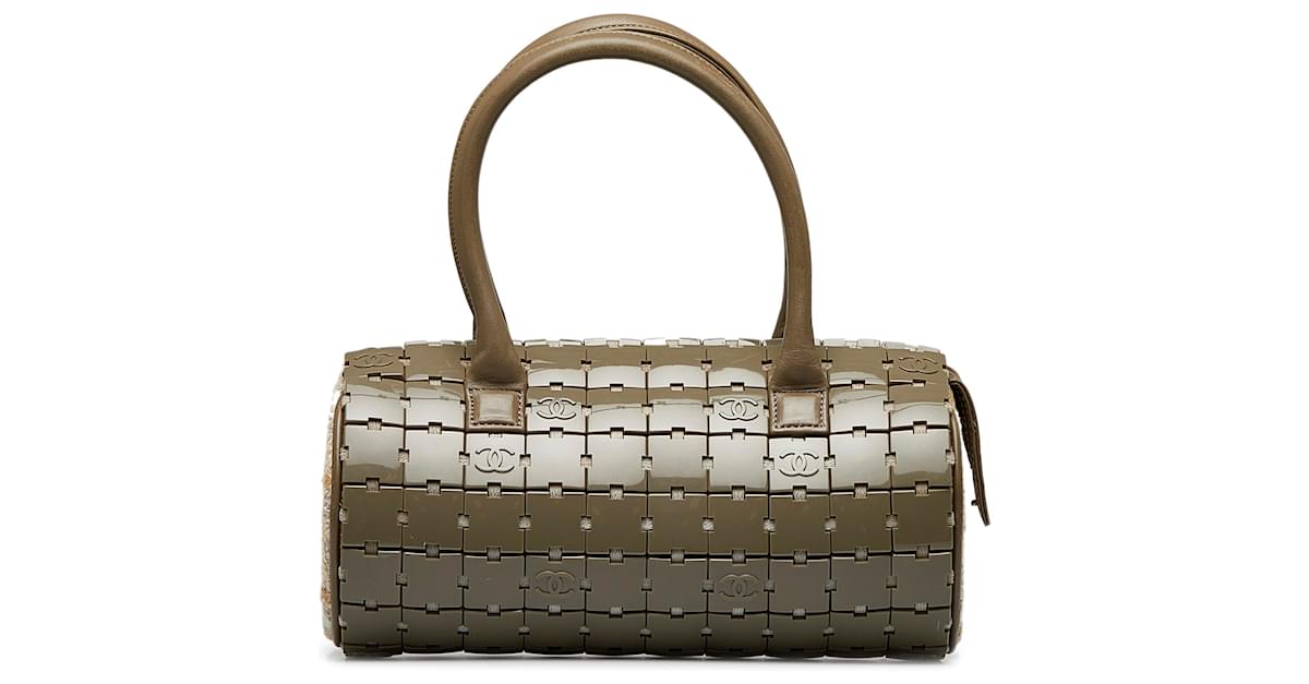 Chanel Gray Lucite Puzzle Barrel Handbag Grey Plastic ref.945676 - Joli  Closet
