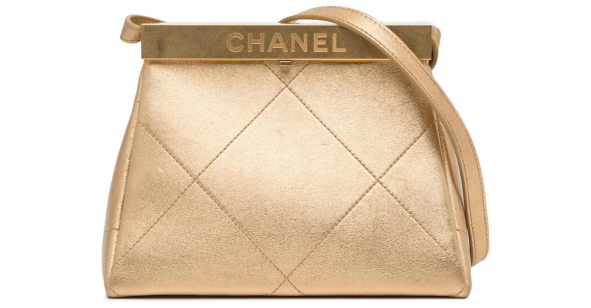 Chanel Gold Kiss Lock Frame Bag Golden Leather Pony-style calfskin  ref.946534 - Joli Closet