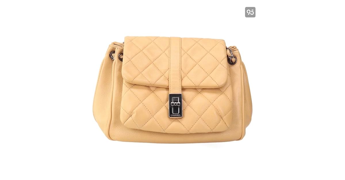 CHANEL Mademoiselle Lock Accordion Flap Caviar Medium Bag