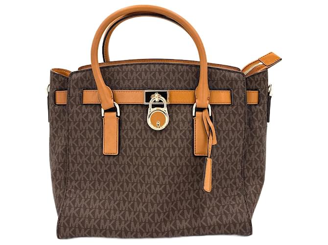 Michael Kors Hamilton Monogram Canva Brown Cloth ref.952720 - Joli Closet