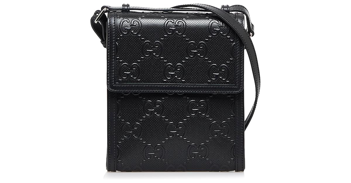 Gucci GG Embossed Leather Messenger Bag in Black for Men