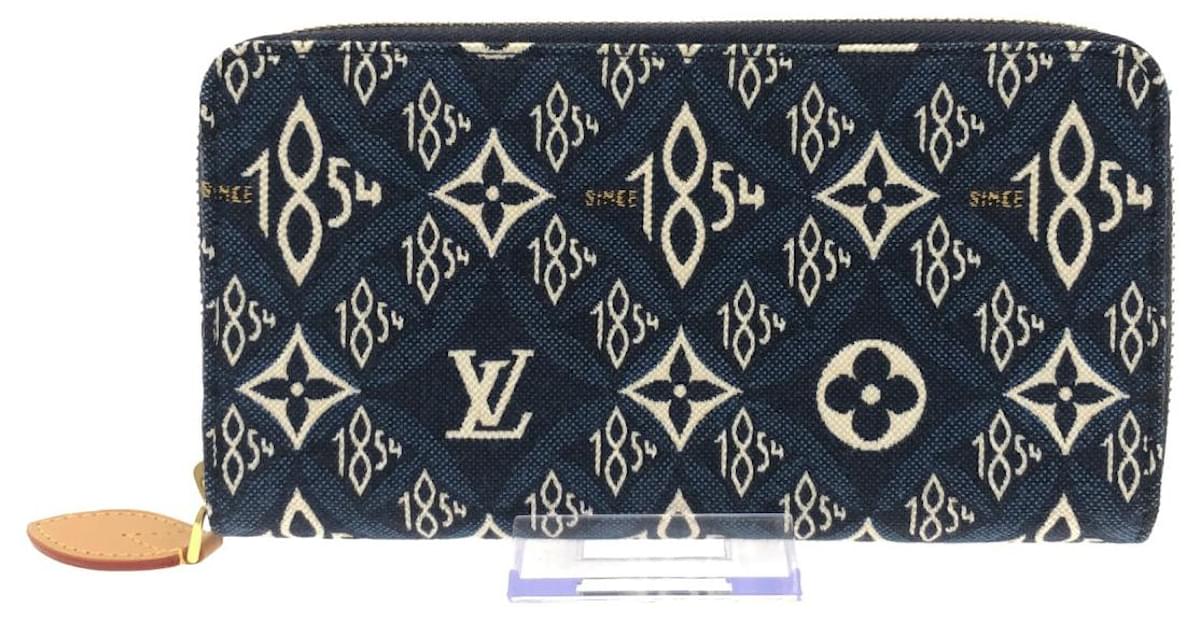 LOUIS VUITTON Blue Since 1854 Canvas Zippy Wallet - The Purse Ladies