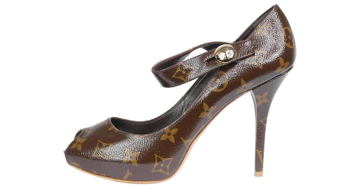 Louis Vuitton pre-owned yellow patent monogram embossed wedge heels