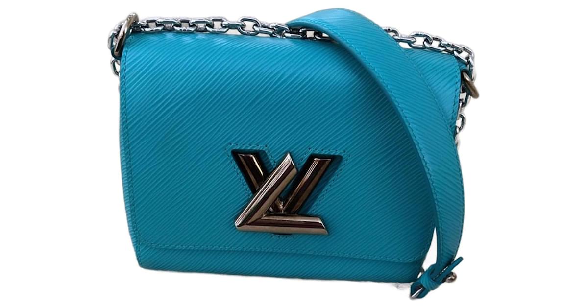 Louis Vuitton LV Twist handbag MM blue Light blue Leather ref