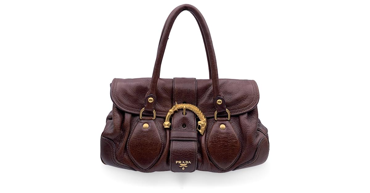 Prada dragon buckle bag best sale