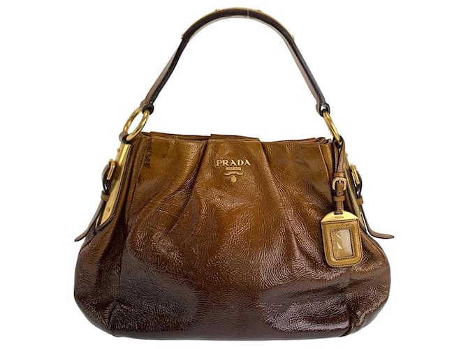 Typing Tutor Prada Bag Black And Gold Prada Logo Top Handle Bag