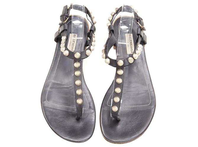 CAGOLE FLAT SANDALS IN BLACK WAX-OIL SHEEPSKIN