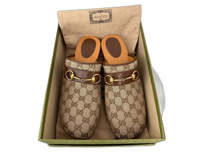 Gucci Beige and Brown Monogram Mules with Gold Detail Gucci Monogram Goatskin Horsebit Clog Mules 37 Beige Ebony  main image 3