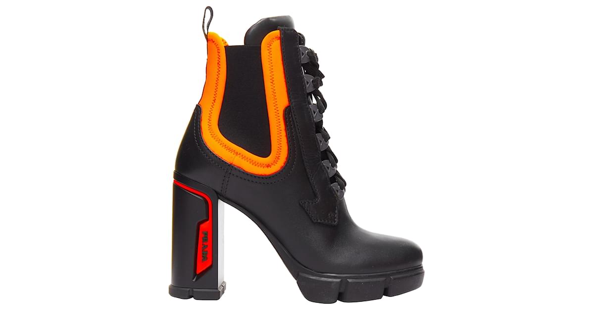 Prada orange and black boots on sale