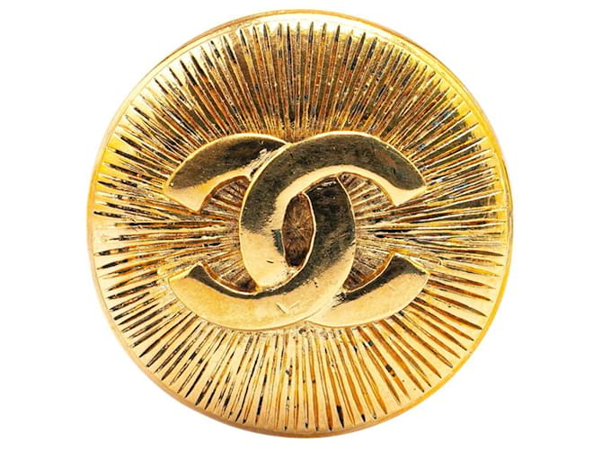 Broche ronde dorée