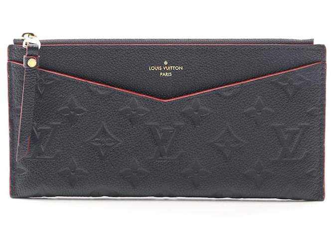 Louis Vuitton Pochette Mélanie BB Monogram Empreinte Leather Pouch