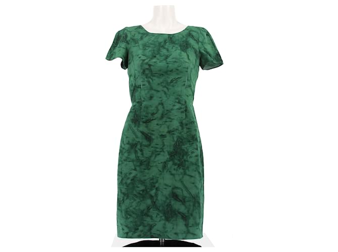 prada green silk dress Prada Ambassador Sadie Sink wore a #Prada double satin dress in sage green, featuring an apron-style bodice and an asymmetrical skirt, while attending the EE BAFTA Film Awards 2026 in London, United