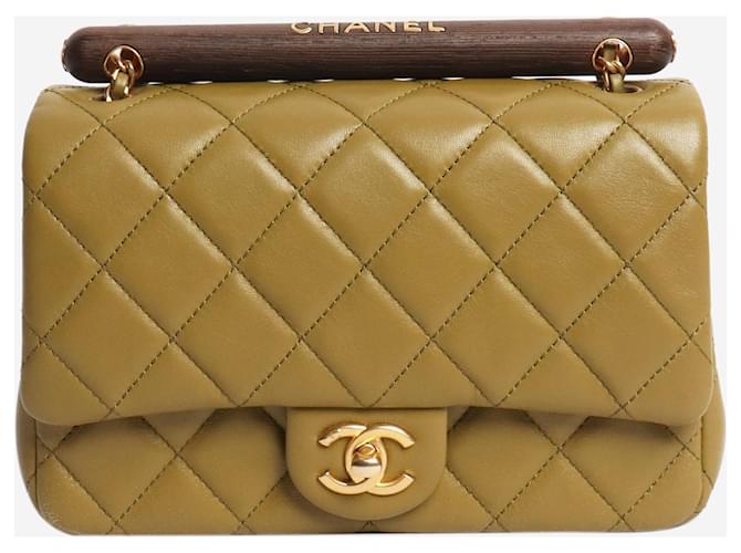 Chanel Olive green lambskin flap bag with a wooden handle Leather