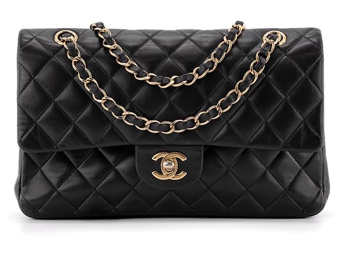 CHANEL - Classic/Timeless 11.12 Chanel Black Leather Handbag Metal