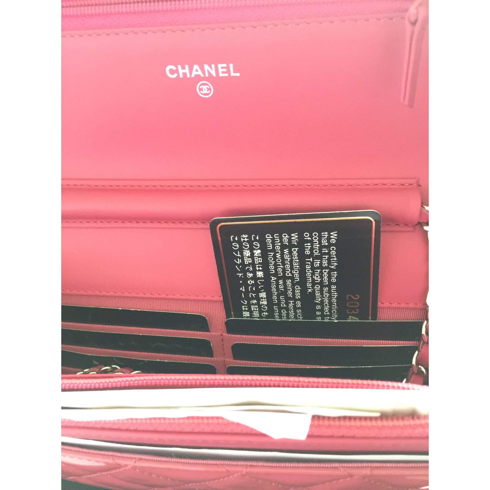 Pink Chanel wallet on chain WOC