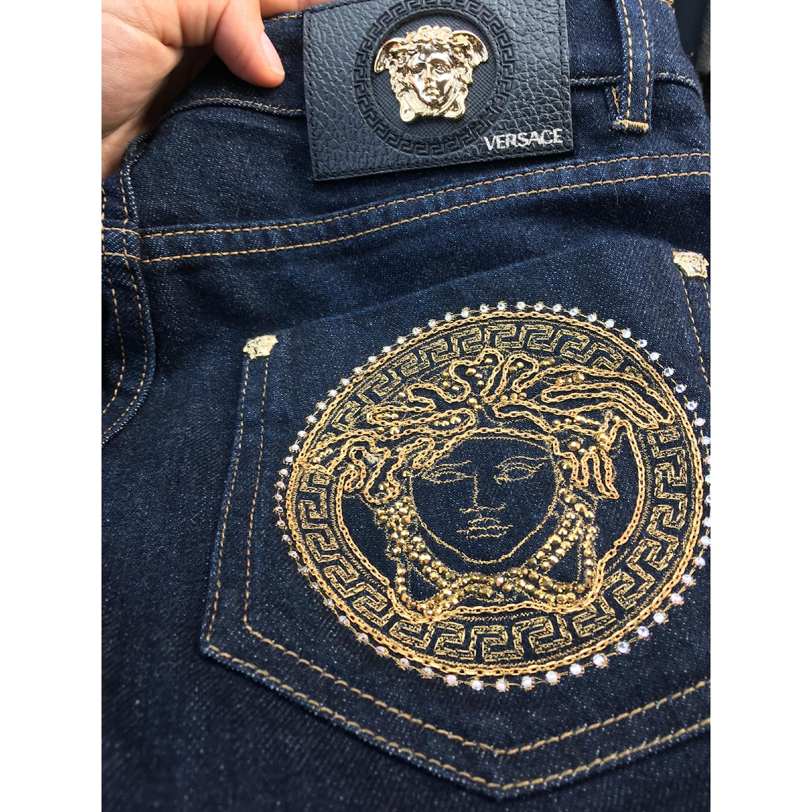versace embroidered jeans