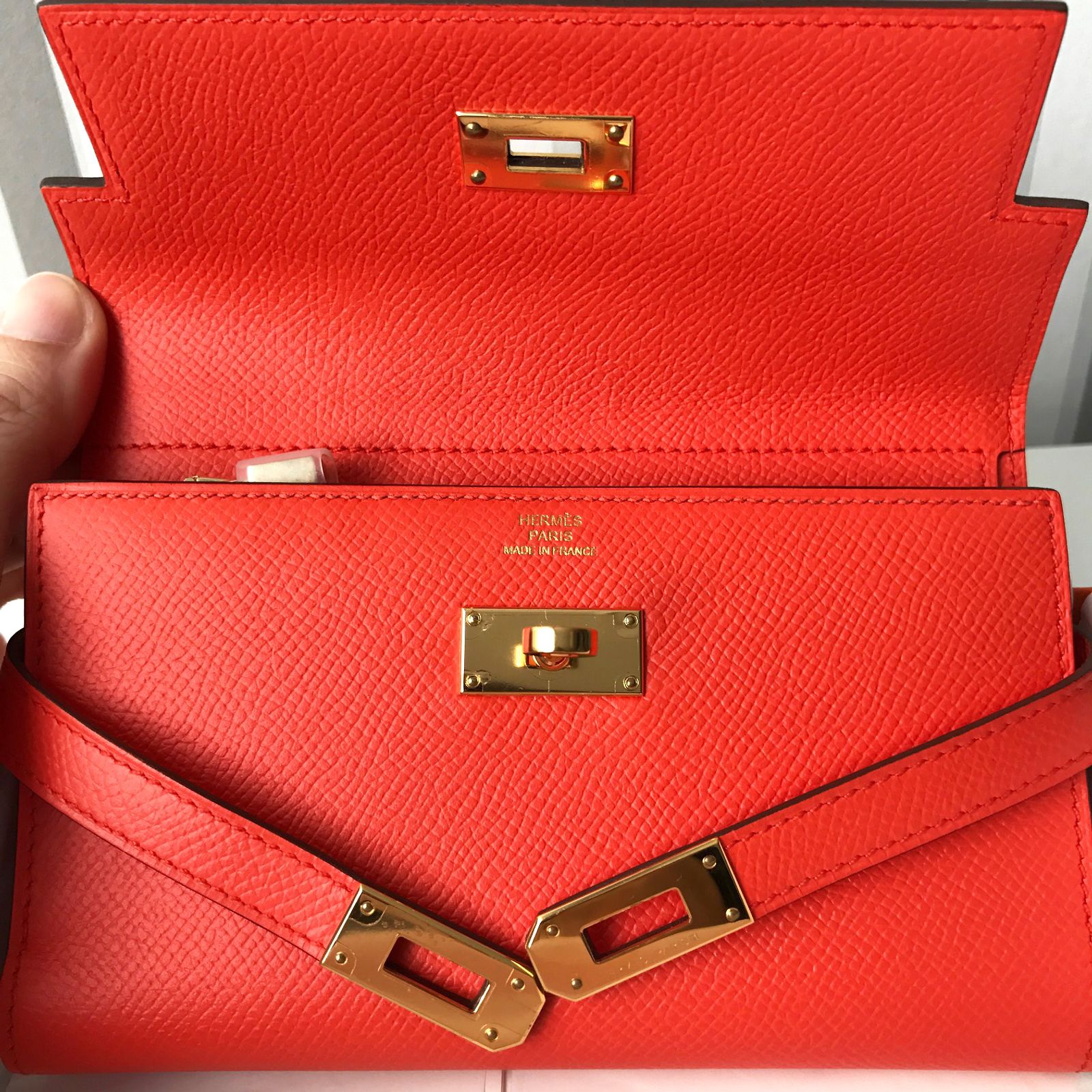 Portefeuille Rond HERMES - Cuir Epsom Orange - PHW (plaqué Argent) - Occasion