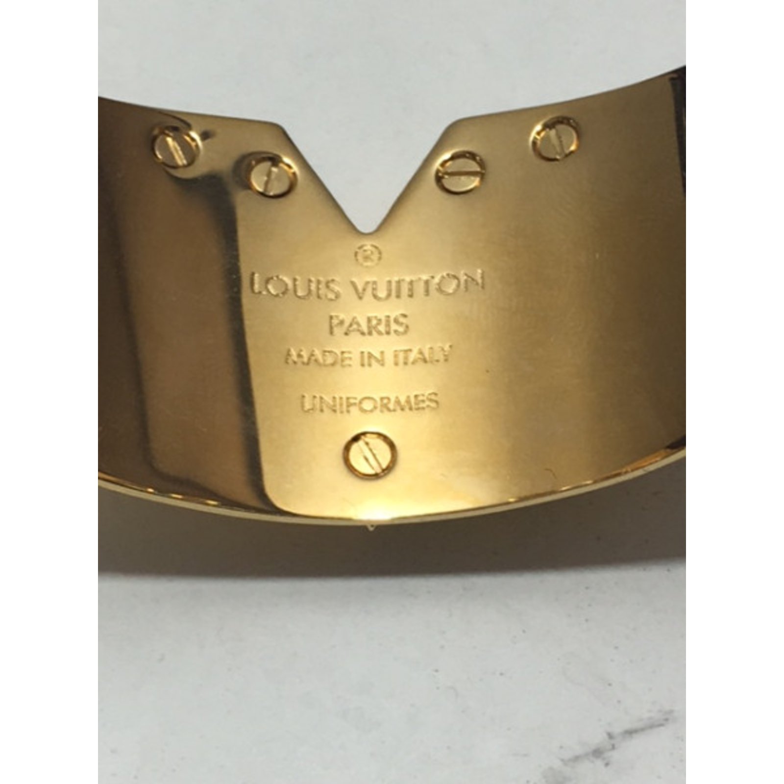 Other jewelry Louis Vuitton golden steel circular bracelet buckle accessory LV  logo ref.408187 - Joli Closet