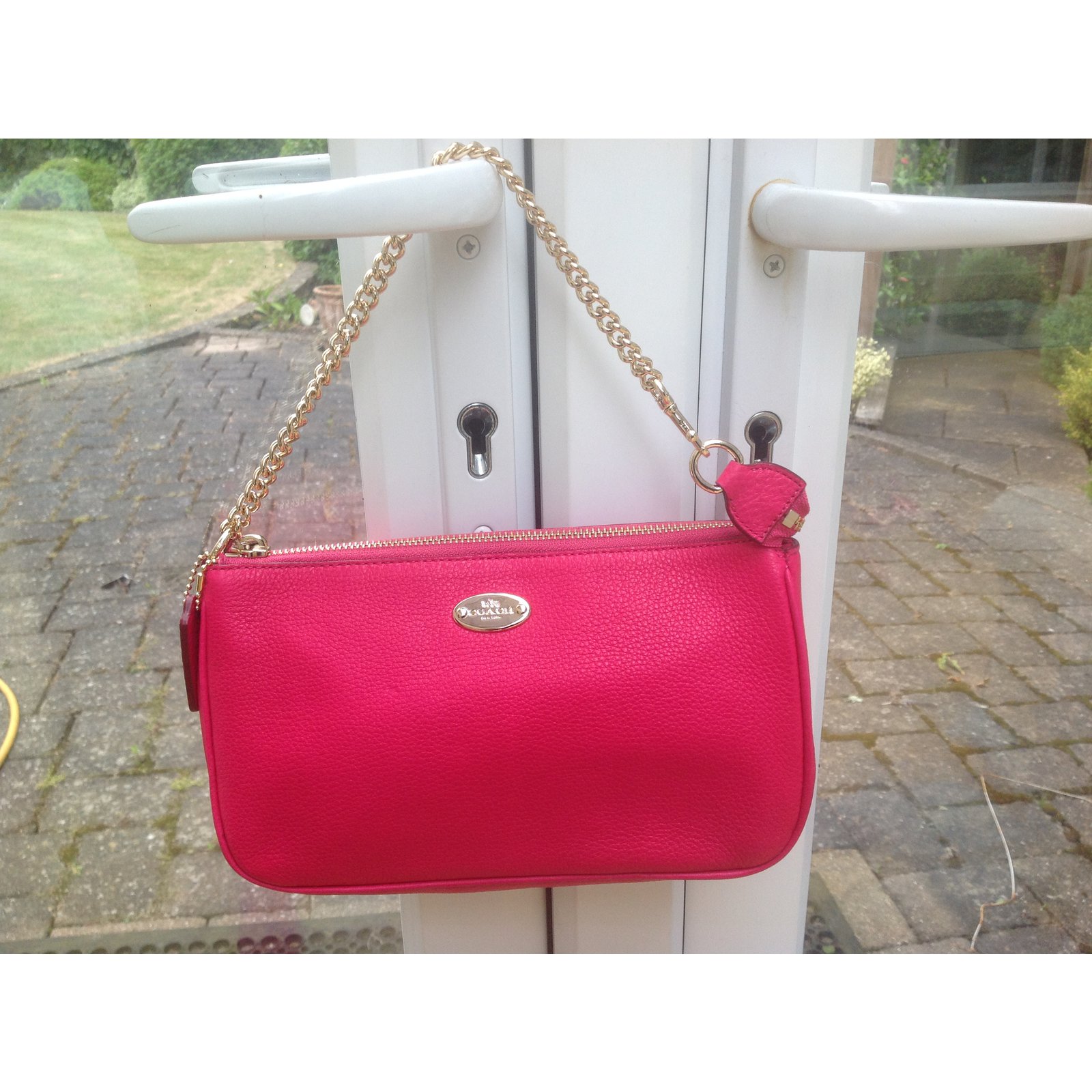 Small coral pink coach clutch with mini sliver chain... - Depop