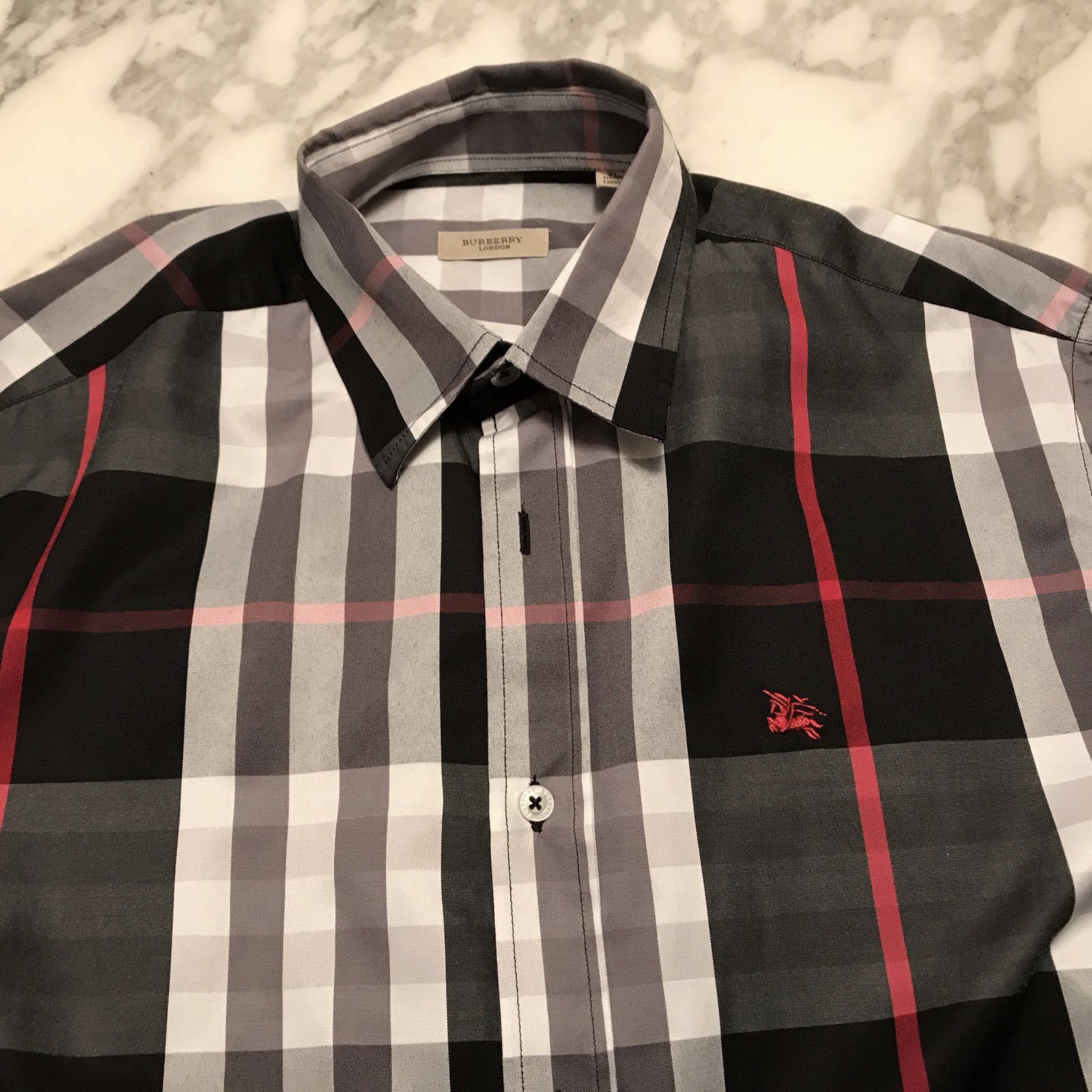 red and white burberry shirt