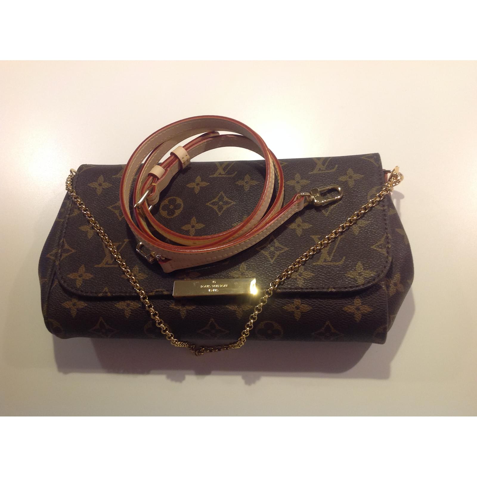 louis vuitton eva clutch price 2017