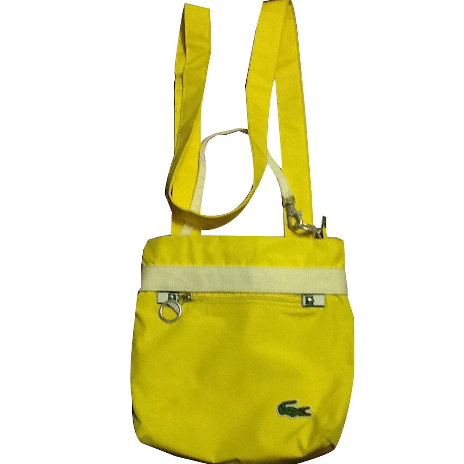 Lacoste Clutch bags Yellow Cotton ref.56323 Joli Closet