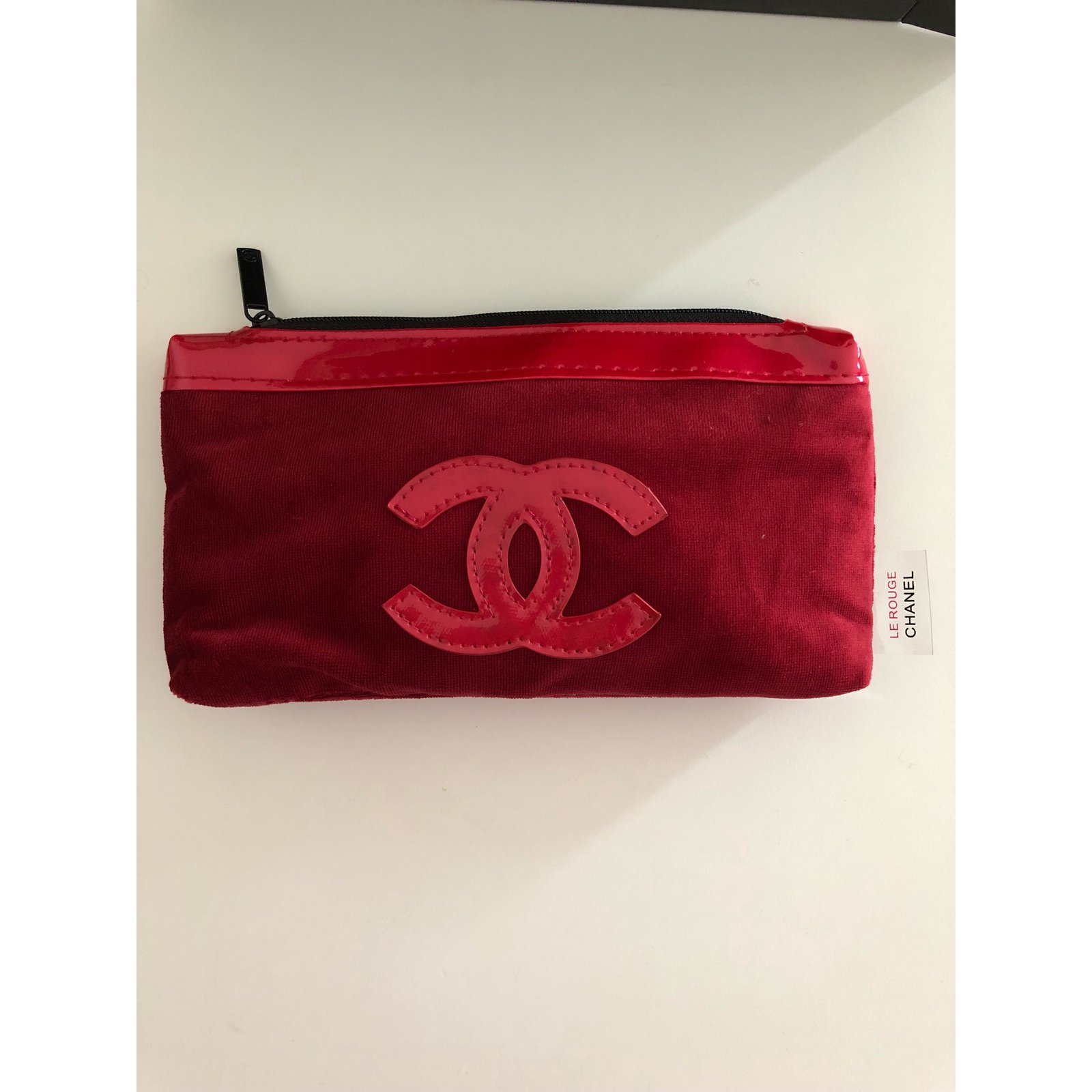 red chanel clutch bag