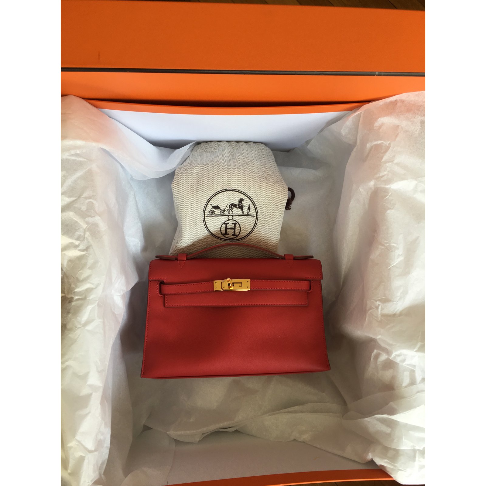 Kelly to go leather clutch bag Hermès Red in Leather - 36912120