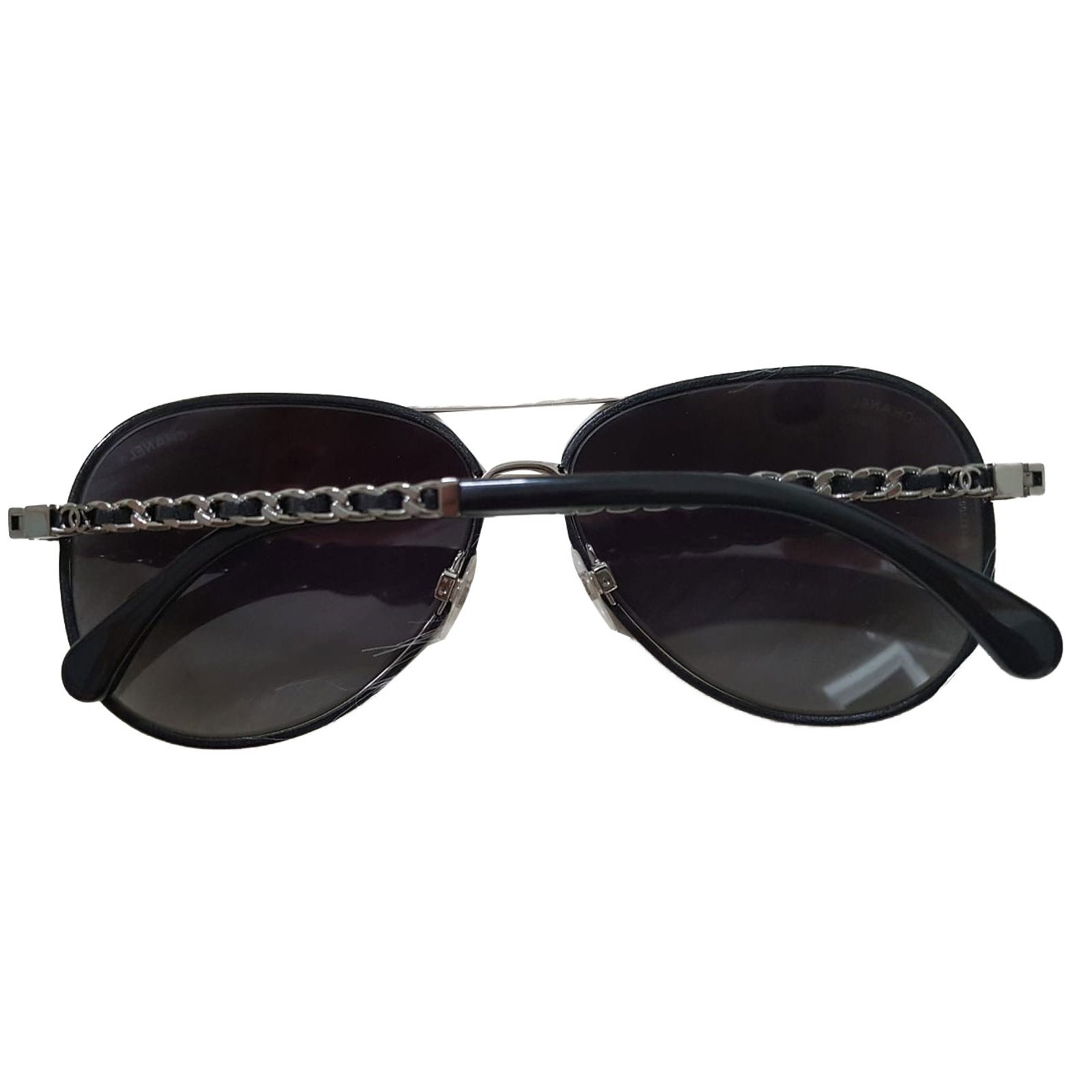 Vintage CHANEL Sunglasses CC in Gilt Metal and black acetate at