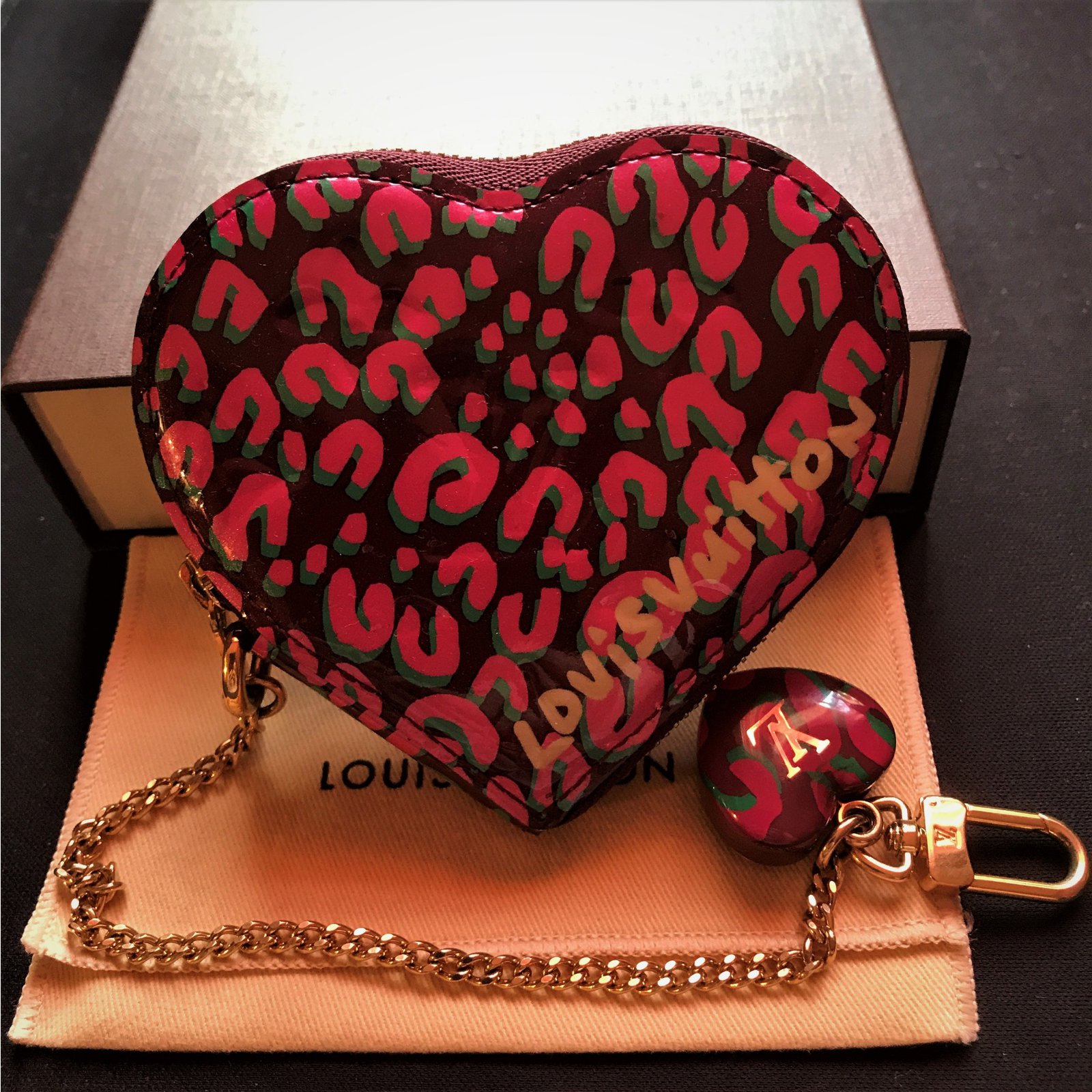 Louis Vuitton coin purse Leopard print Patent leather ref.79479