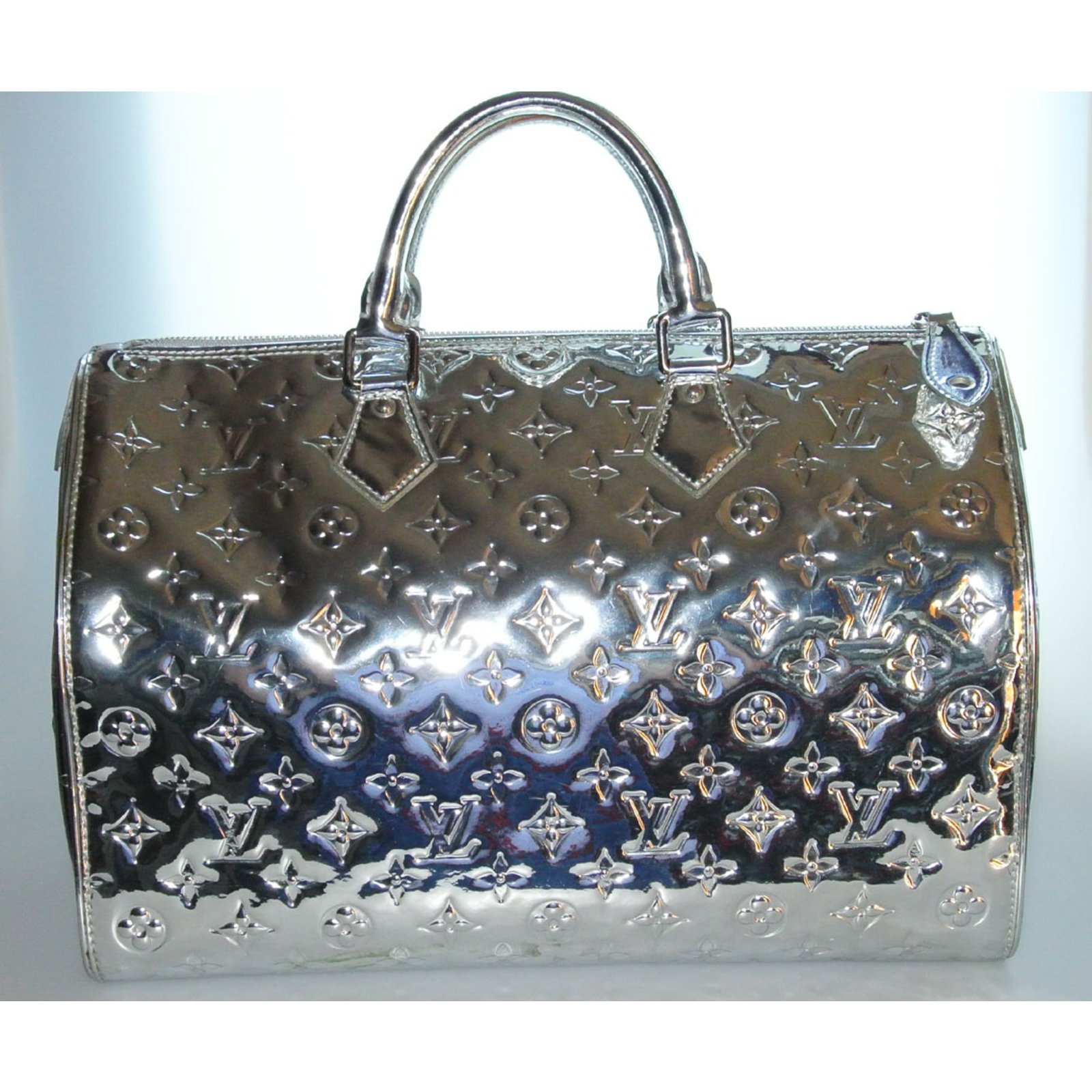 A LIMITED EDITION SILVER MONOGRAM MIROIR SPEEDY 30 WITH SILVER HARDWARE, LOUIS  VUITTON, 2006