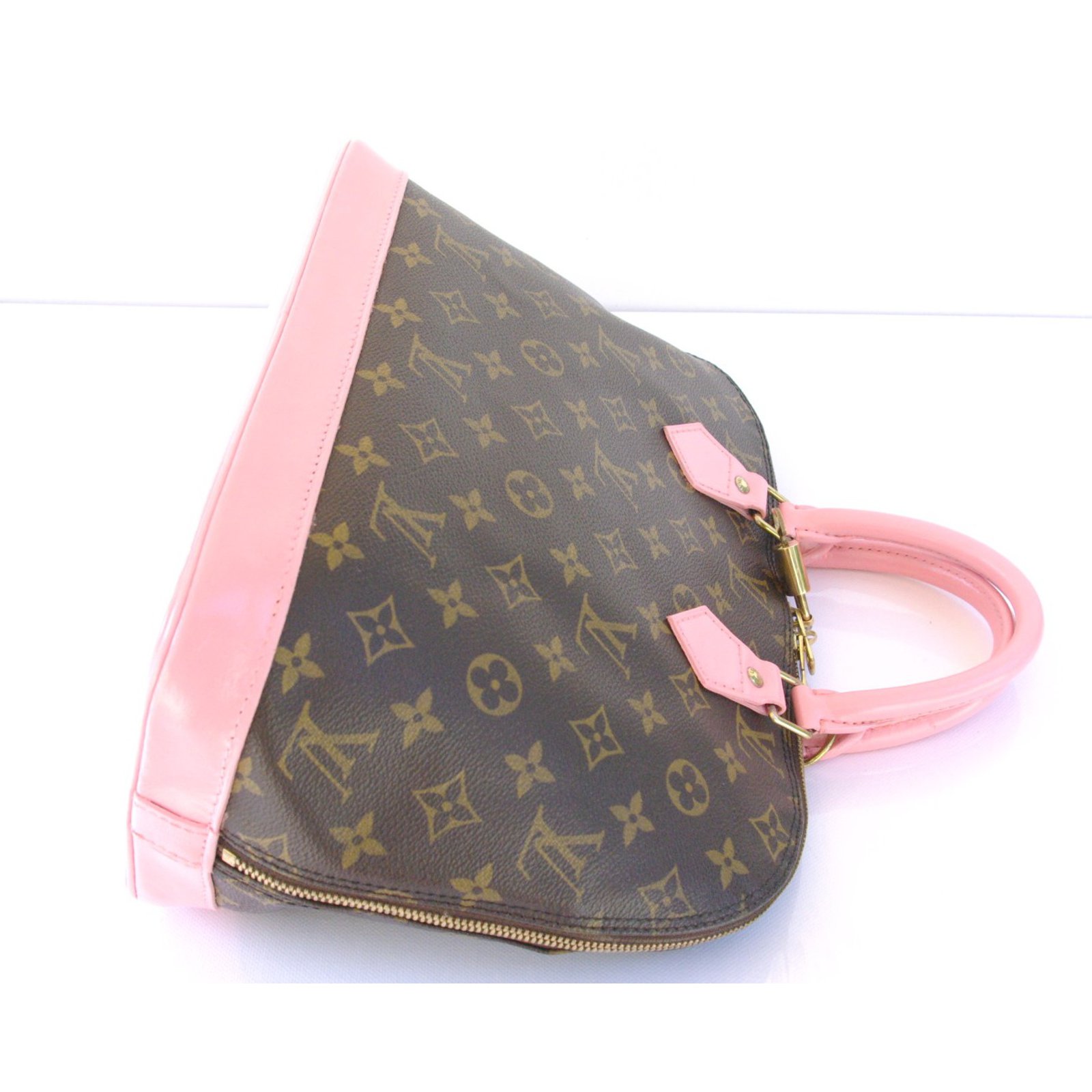 Louis Vuitton ALMA MONOGRAM Pink Golden Leather Cloth ref.103367 - Joli  Closet