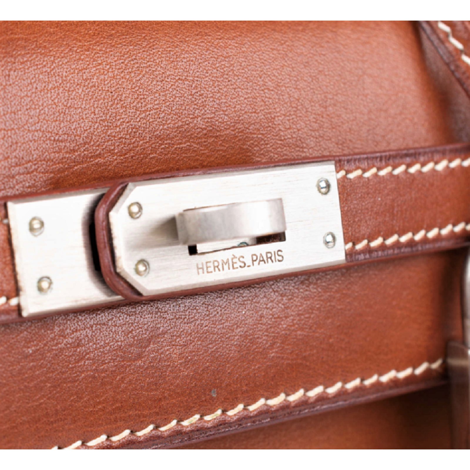 Sold at Auction: HERMÈS, Hermes A Rare Fauve Barenia Faubourg Leather  Retourne Kelly 25 with Palladium Hardware