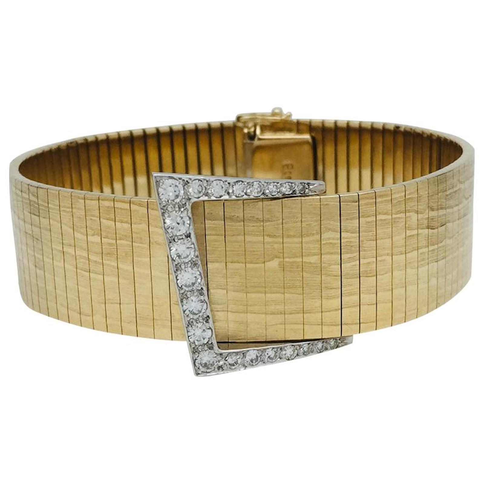 inconnue Two gold and diamond belt bracelet. White gold Yellow gold ref