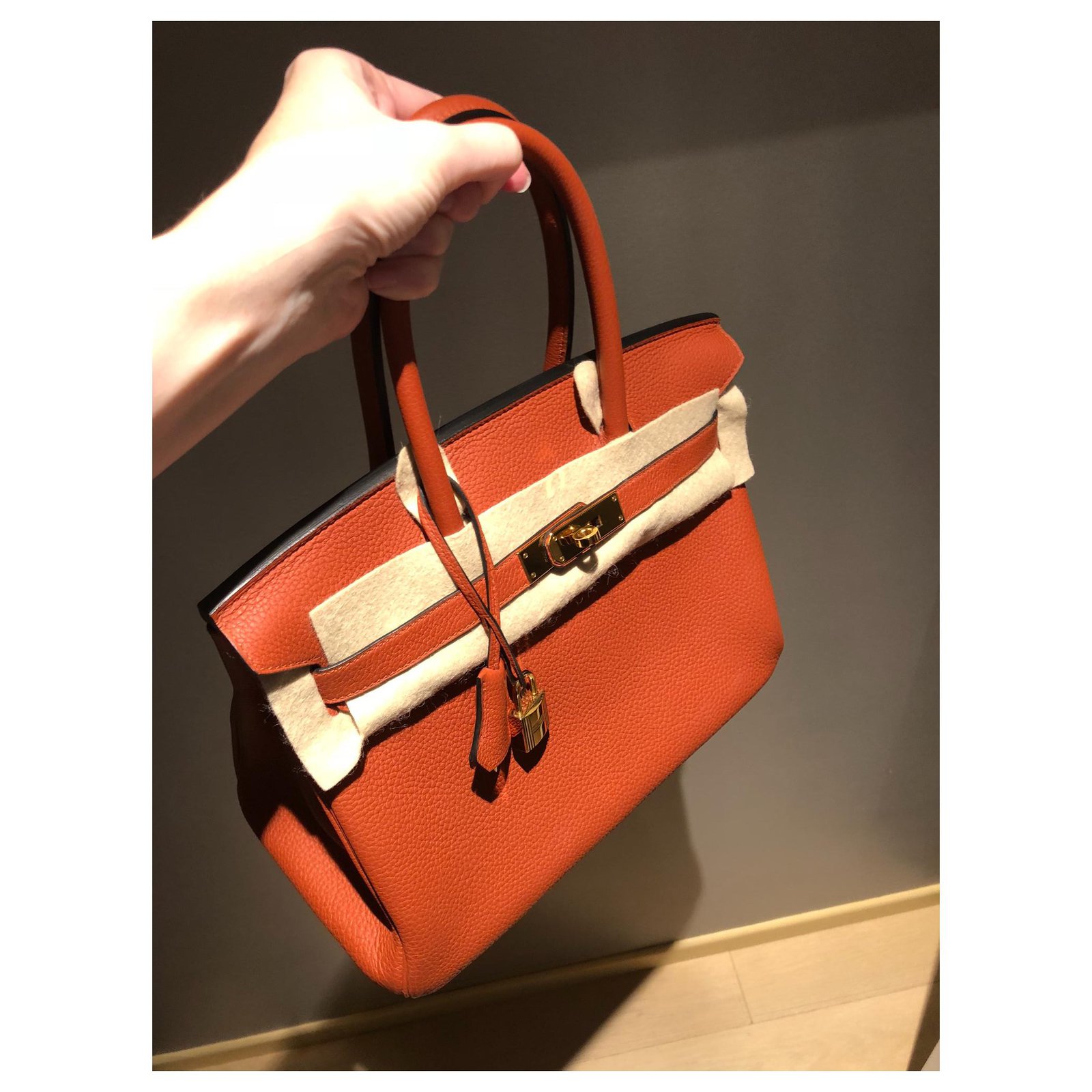 Hermès 30 CM Red Birkin Bag with orange piping and interior