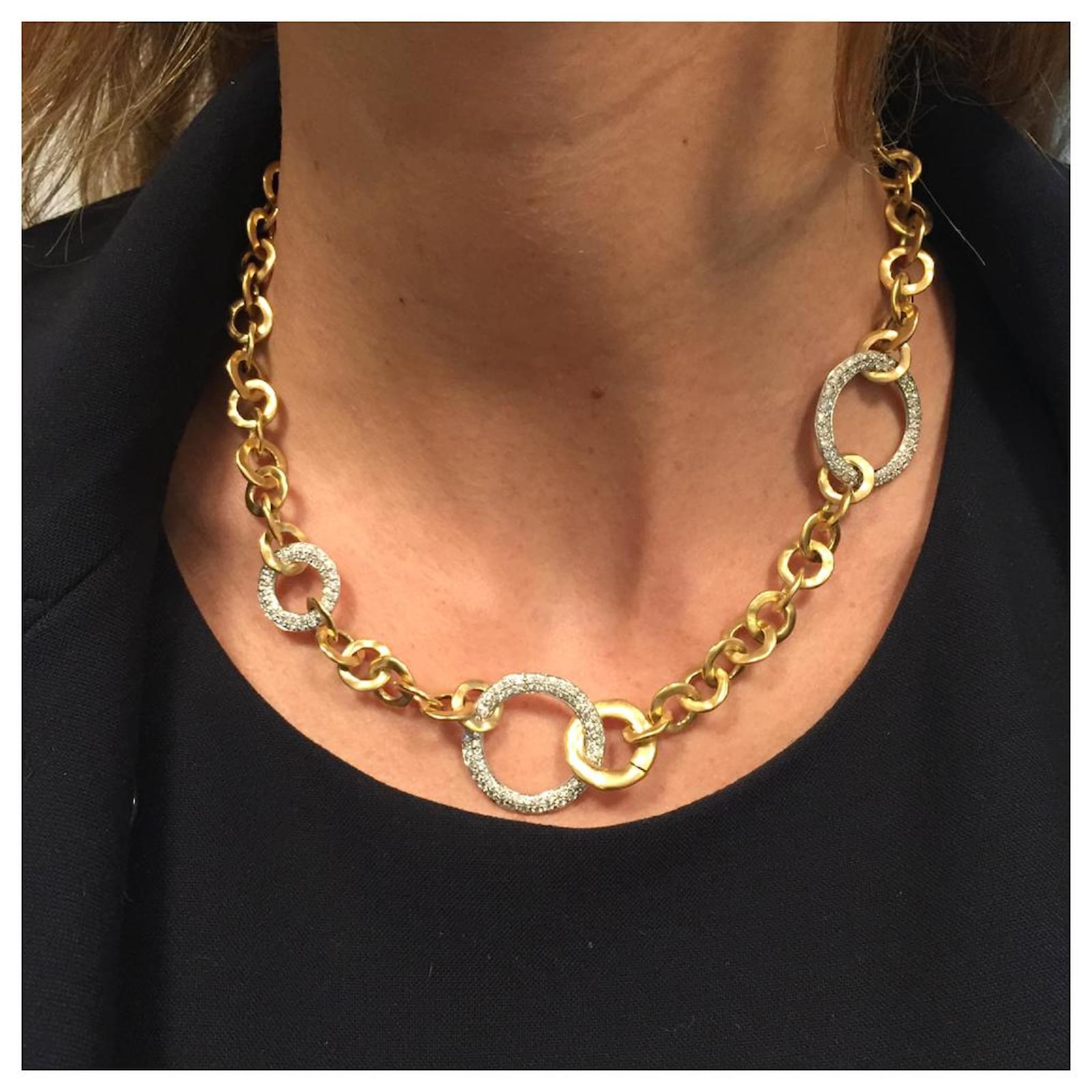 Pomellato necklace, model "flat mesh", two tones of gold and diamonds. White gold Yellow gold